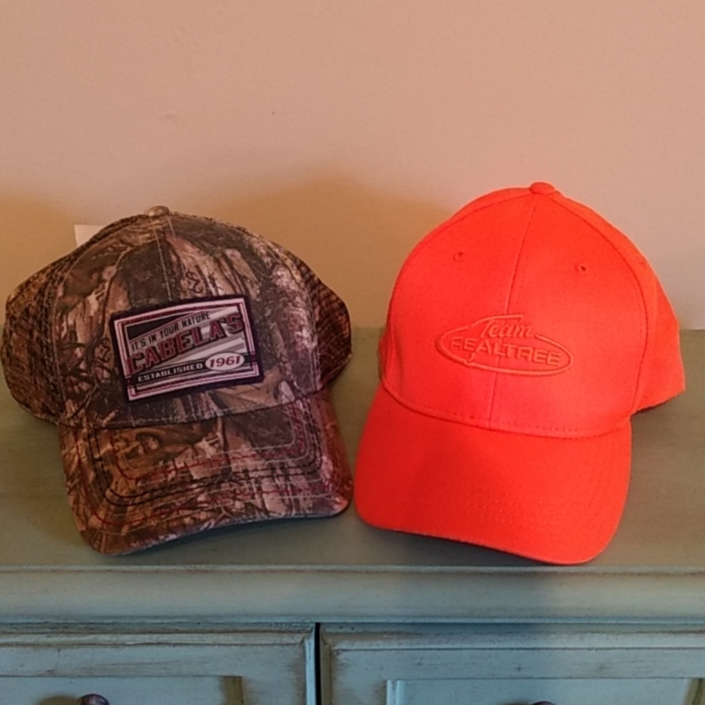 Two men's ball caps